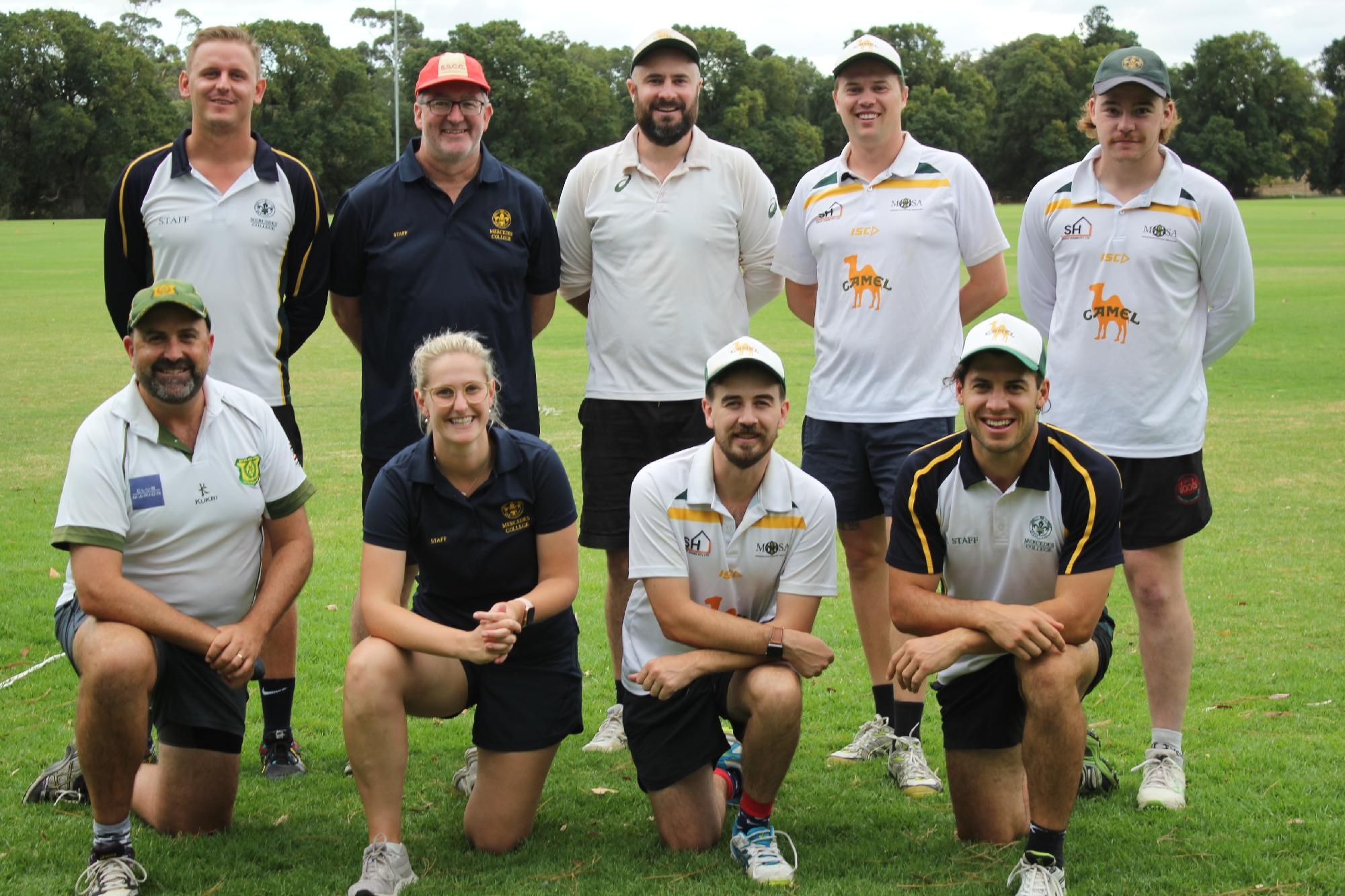 Group photo of Mercedes College cricket players and staff during a community match.