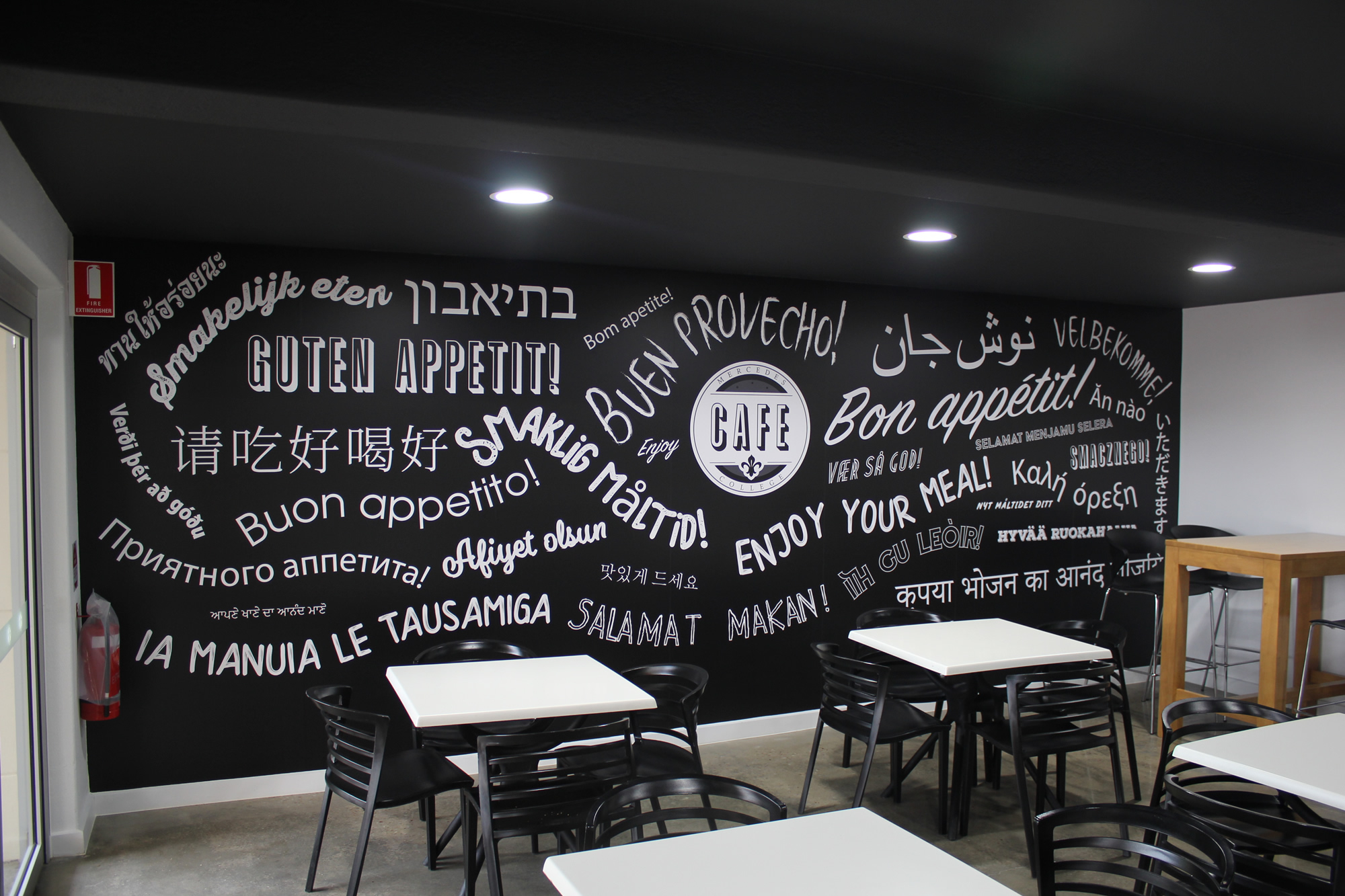 Mercedes College café wall with “Bon Appétit” written in multiple languages.