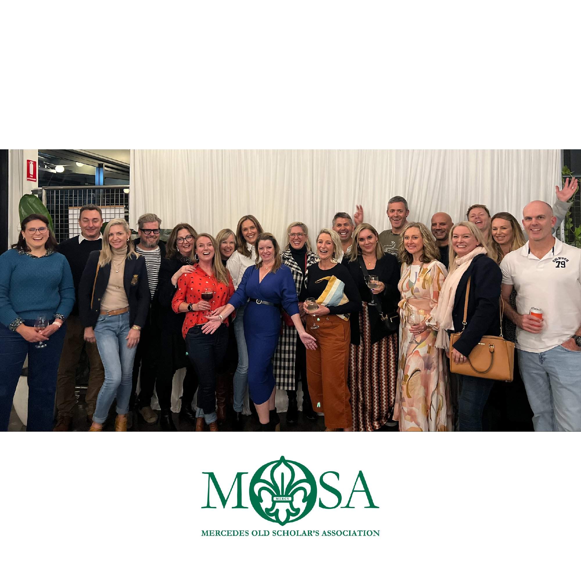 Mercedes Old Scholars’ Association group photo with alumni gathered at a reunion event.